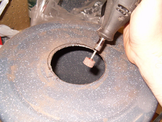 The freshly cut hole before grinding