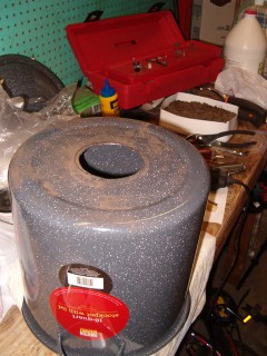 Pot with hole cut for mounting flange